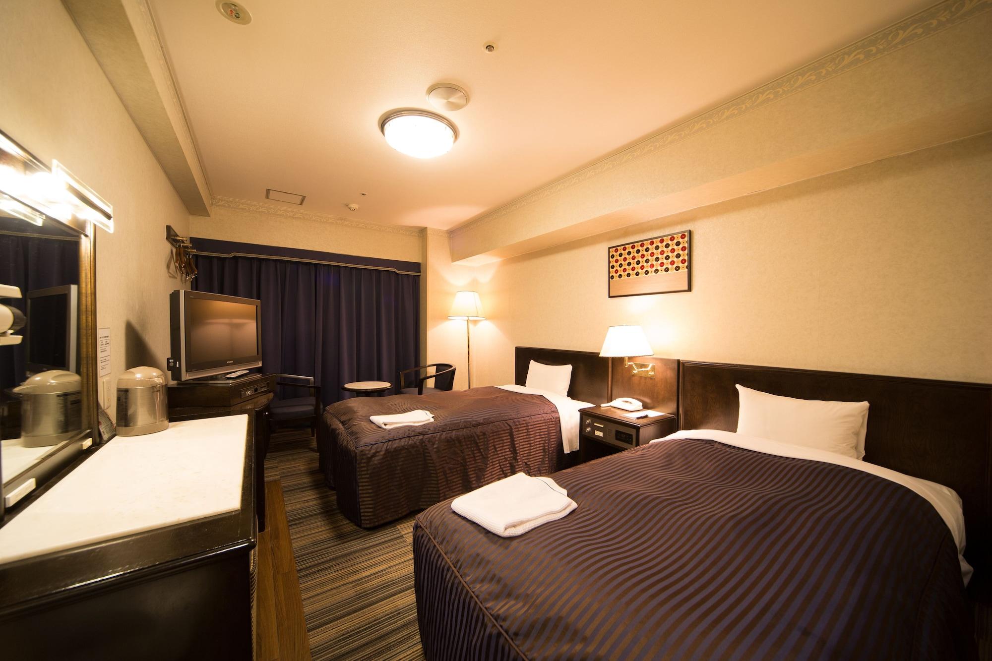 Hotel Claiton Esaka Suita Esterno foto