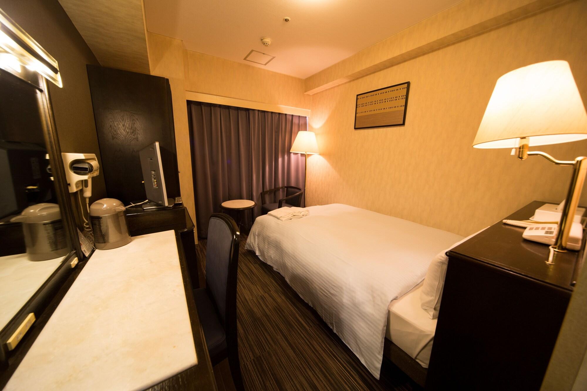 Hotel Claiton Esaka Suita Esterno foto