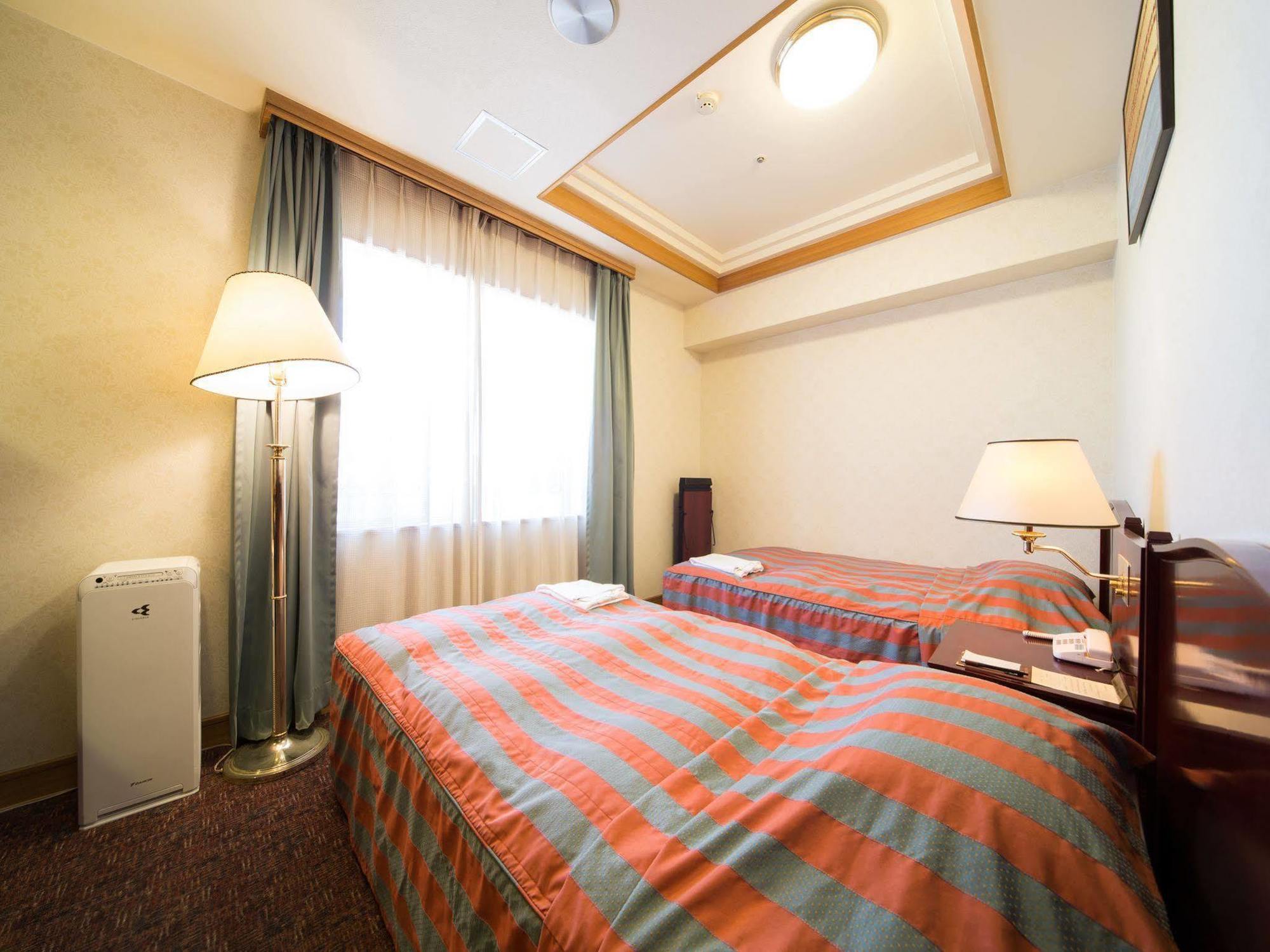 Hotel Claiton Esaka Suita Esterno foto