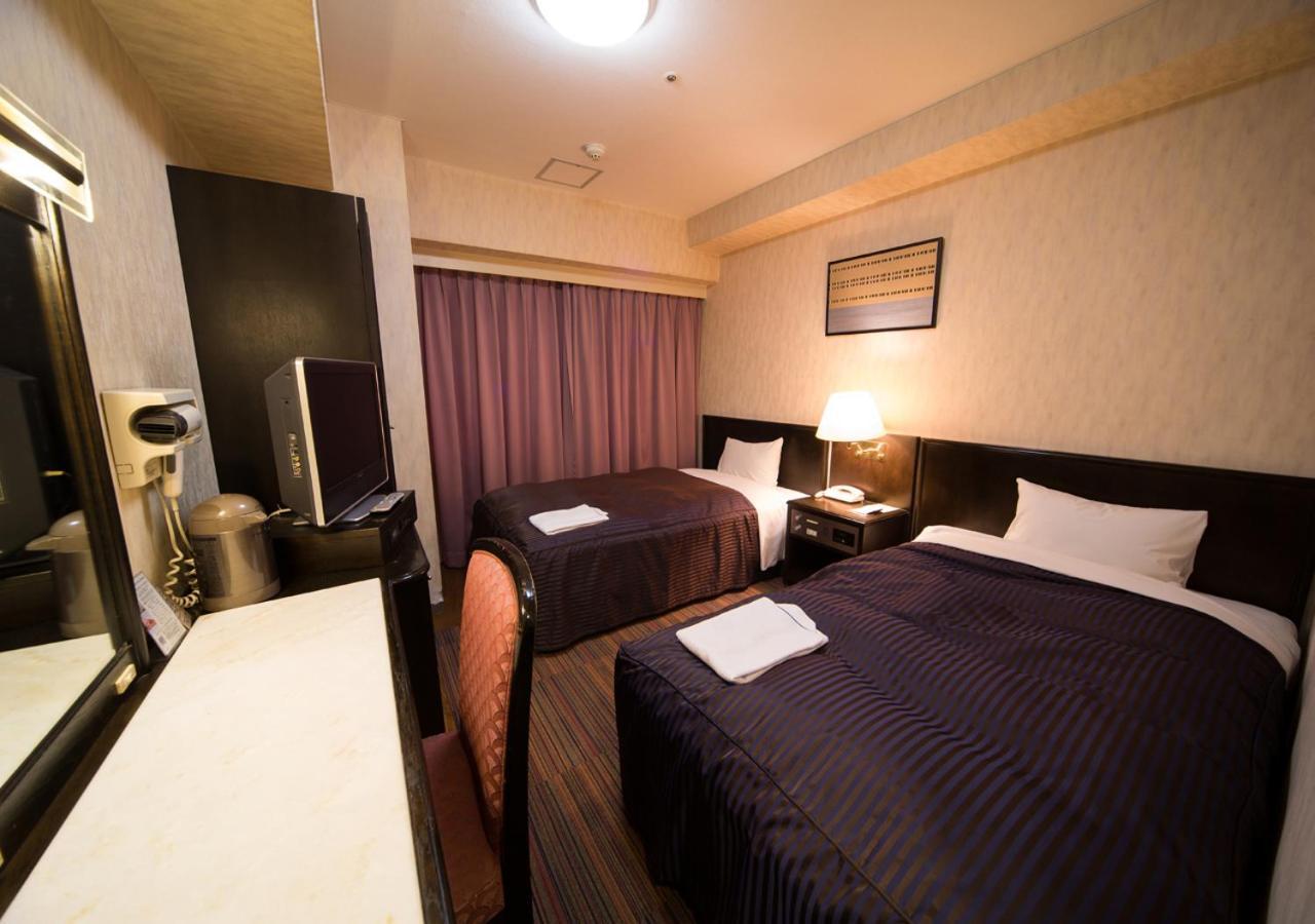 Hotel Claiton Esaka Suita Esterno foto